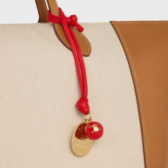Maison Celine medaillonbedel van glad lamsleer en metaal