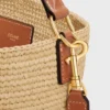 Medium Louise-bucket in raffia en kalfsleer