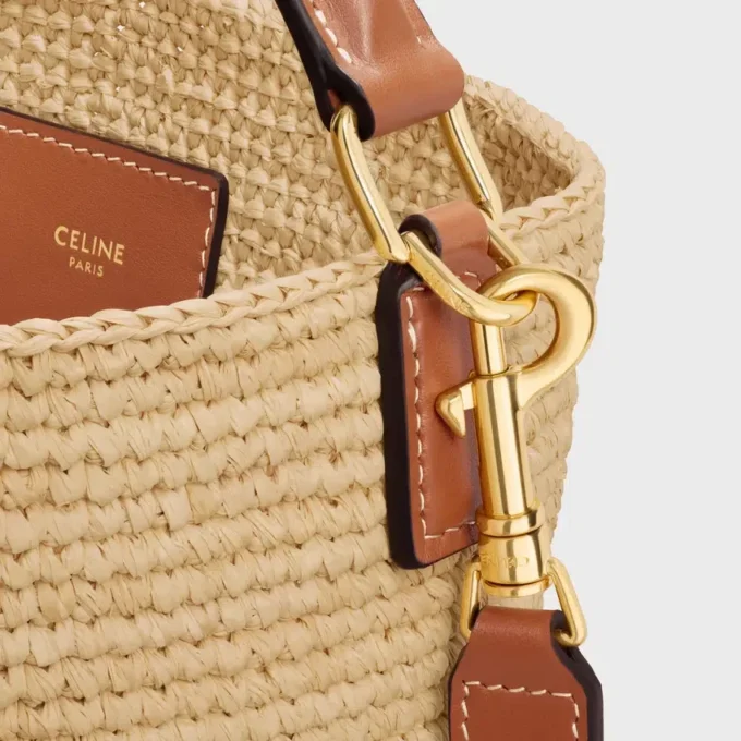 Medium Louise-bucket in raffia en kalfsleer