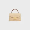 Teen Nino-tas van raffia en kalfsleer