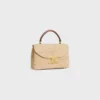 Teen Nino-tas van raffia en kalfsleer