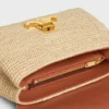 Teen Nino-tas van raffia en kalfsleer