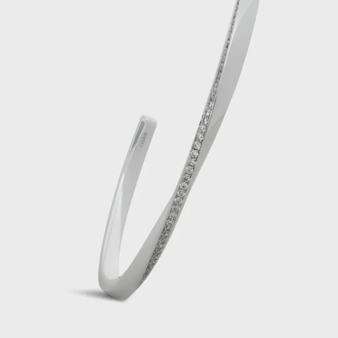 Torsion-armband in witgoud en diamanten