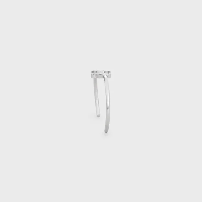 Triomphe asymmetrische manchet in messing met rhodiumafwerking