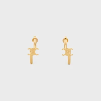 Triomphe asymmetrische oorringen van messing met gouden afwerking