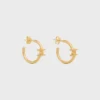 Triomphe asymmetrische oorringen van messing met gouden afwerking