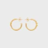 Triomphe asymmetrische oorringen van messing met gouden afwerking