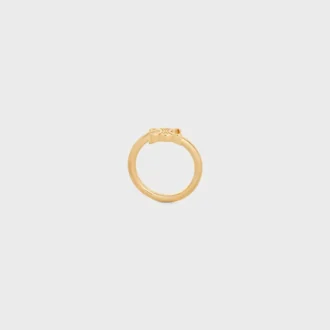 Triomphe asymmetrische ring van messing met gouden afwerking