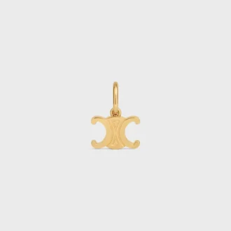 Triomphe-bedels in messing met gouden afwerking