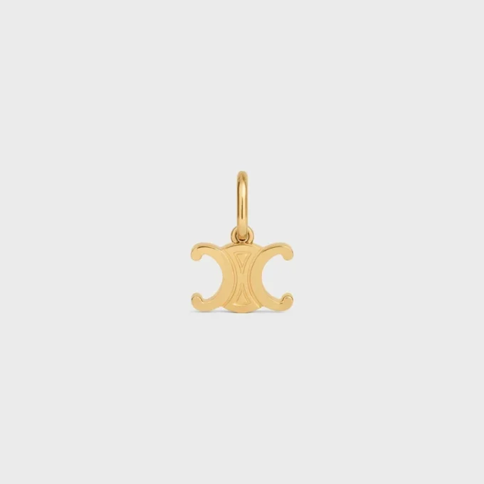 Triomphe-bedels in messing met gouden afwerking