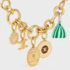 Triomphe-bedels in messing met gouden afwerking