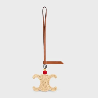 Triomphe-bedeltje van raffia en natuurlijk kalfsleer