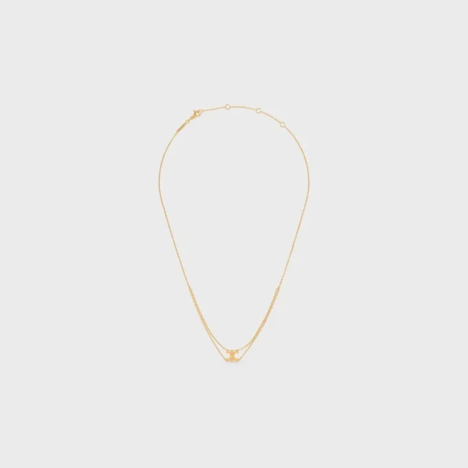 Triomphe hangende ketting van messing met gouden afwerking