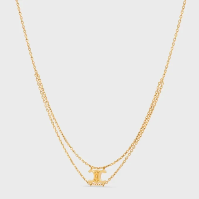 Triomphe hangende ketting van messing met gouden afwerking