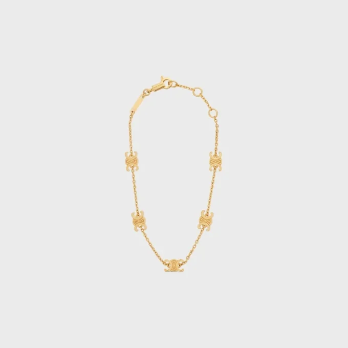 Triomphe Mini Triomphe-armband van messing met gouden afwerking