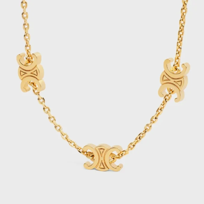 Triomphe Mini Triomphe-armband van messing met gouden afwerking