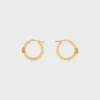 Triomphe-oorbellen van email en messing met gouden afwerking