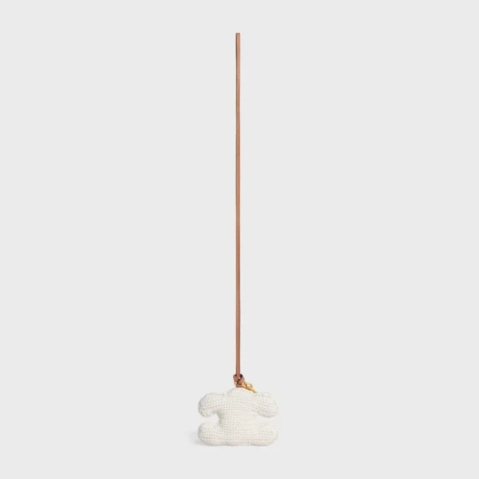 Triomphe Pom-Pom sleutelhanger van gehaakt katoen met gouden afwerking