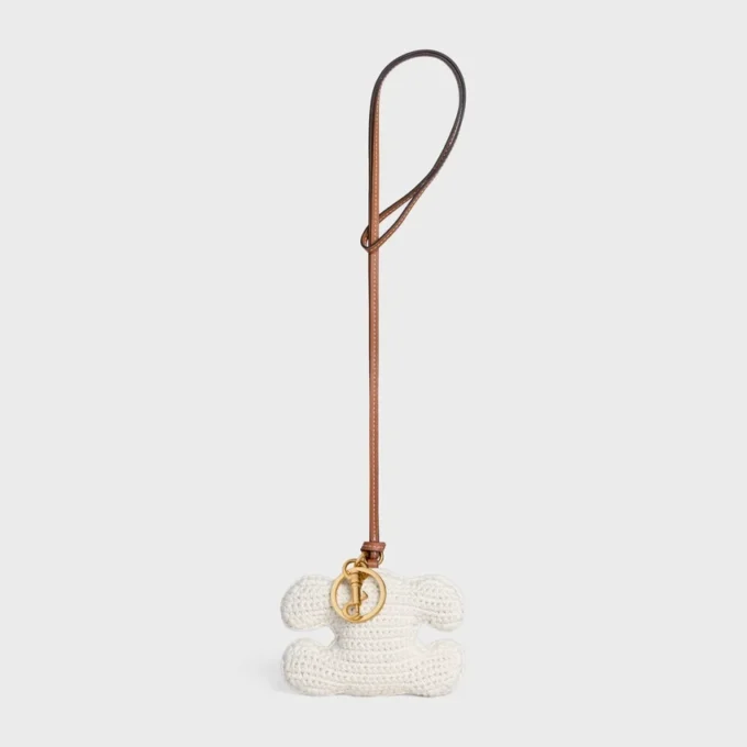 Triomphe Pom-Pom sleutelhanger van gehaakt katoen met gouden afwerking