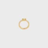 Triomphe-ring van email en messing met gouden afwerking