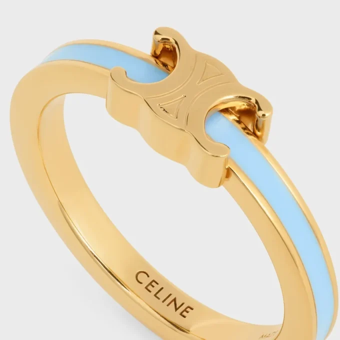 Triomphe-ring van email en messing met gouden afwerking