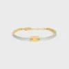 Triomphe scharnierende armband van email en messing met gouden afwerking