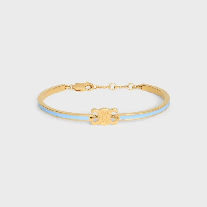 Triomphe scharnierende armband van email en messing met gouden afwerking