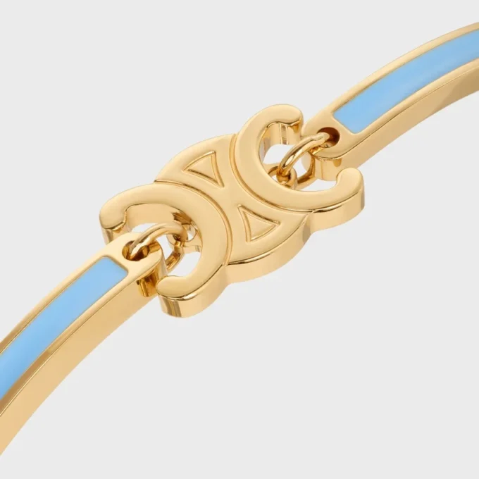 Triomphe scharnierende armband van email en messing met gouden afwerking