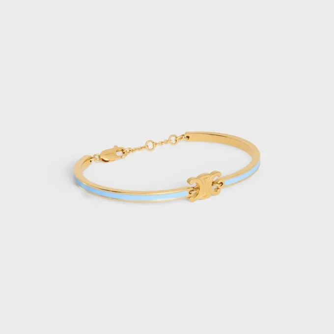 Triomphe scharnierende armband van email en messing met gouden afwerking