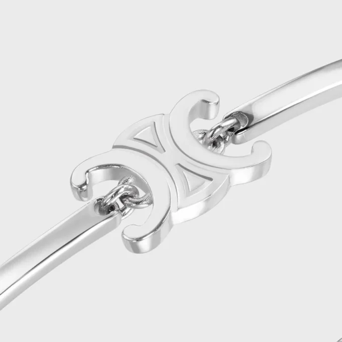 Triomphe scharnierende armband van messing met rhodiumafwerking