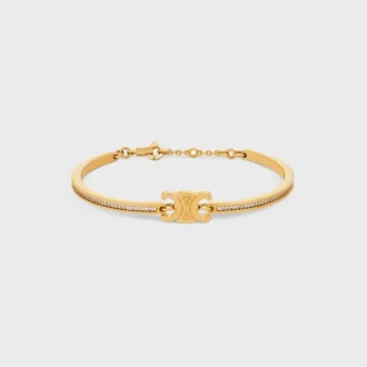 Triomphe scharnierende glinsterende armband van strass en messing met gouden afwerking