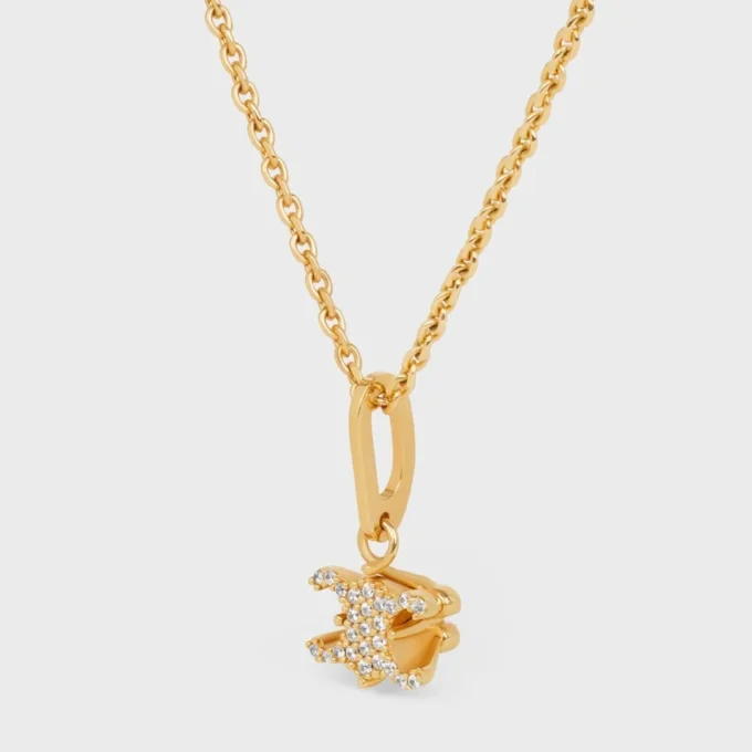 Triomphe Solitaire Sparkle-ketting van strass en messing met gouden afwerking