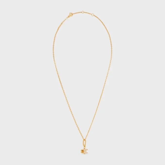 Triomphe Solitaire Sparkle-ketting van strass en messing met gouden afwerking