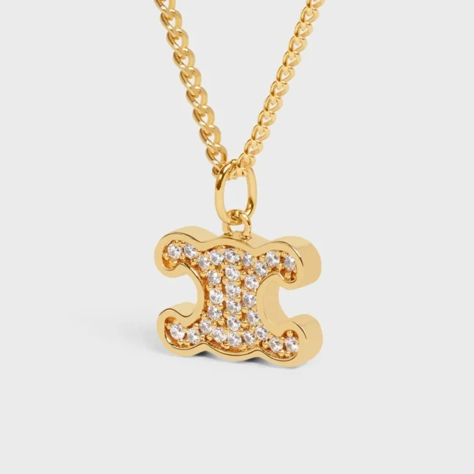 Triomphe strass ketting van messing met gouden afwerking en kristallen