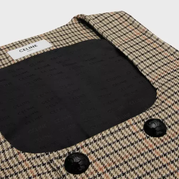Vest met dubbele rij knopen van wol met pied-de-poule-motief